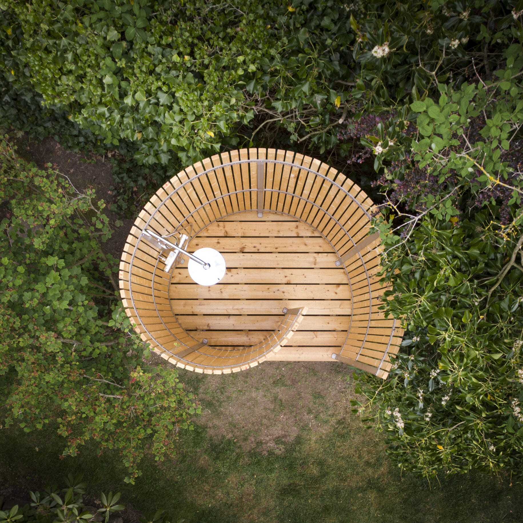 Nordic Seashell outdoor shower - drone photo taken from summer house on the South Sea Islands