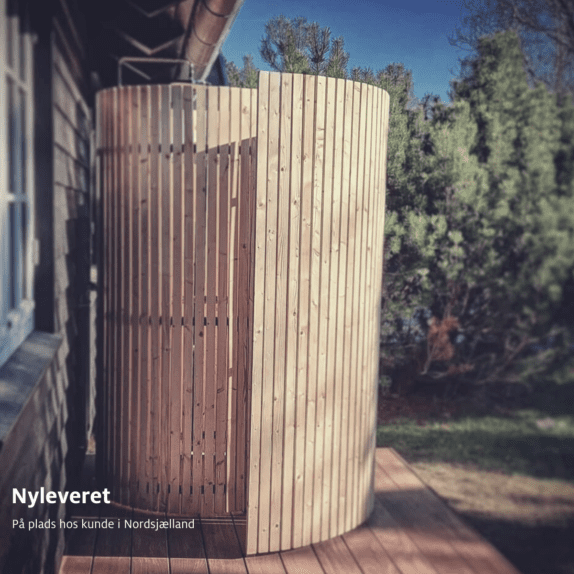 Nordic Seashell Outdoor Shower. Outdoor shower in Danish design. Photo from cottage.
